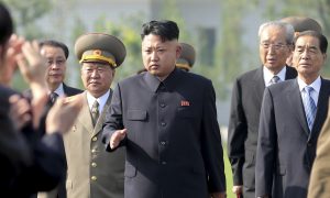 Kim Jong Un Looking 'Chubbier' Than Usual, Forced to Sit Down: Reports