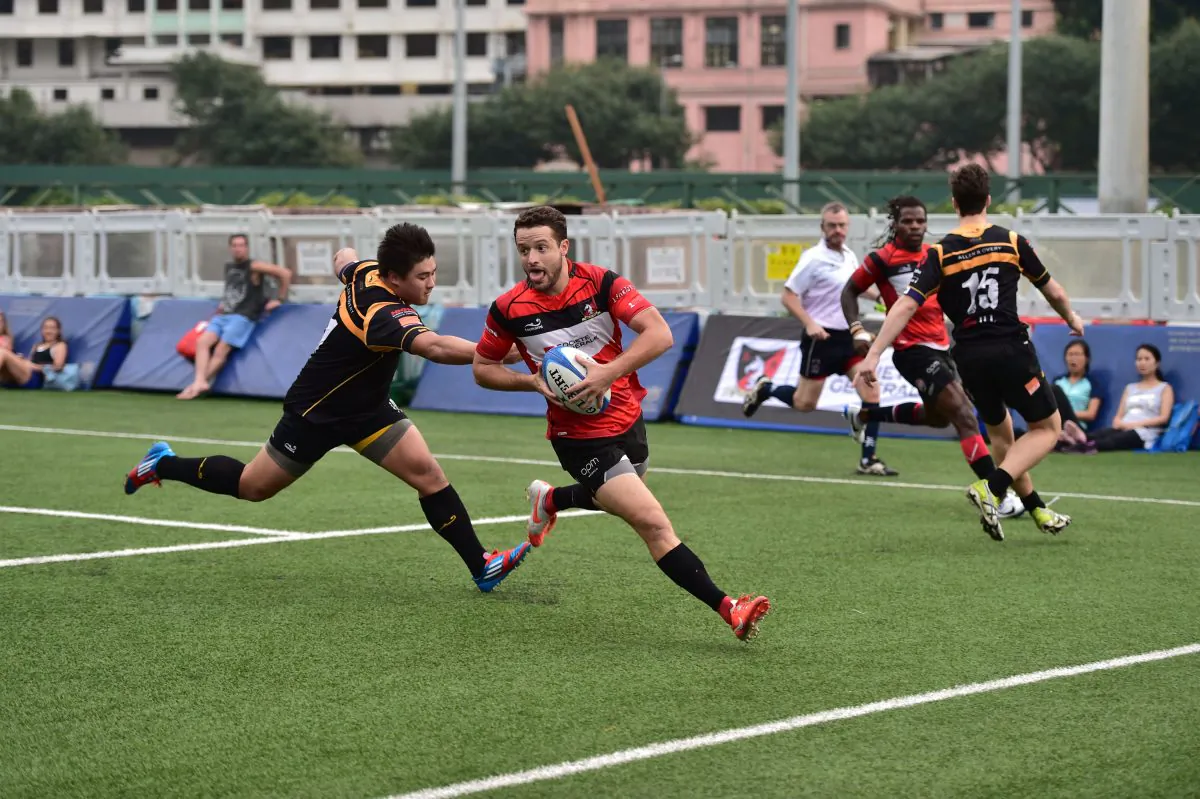 Jean-Baptiste Aldigé runs in for his first of 2-tries for Societe Generale Valley in their HKRFU Premiership match against Borrelli Walsh USRC Tigers at Valley-8 on Saturday Oct 25, 2014. Valley went on to win the match 64-7. (Bill Cox/Epoch Times)