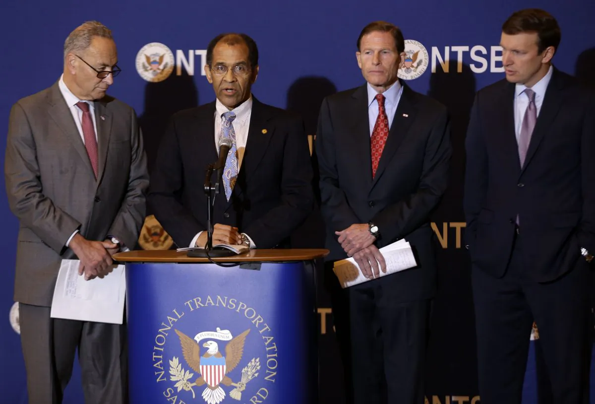 Officials announce causes of five Metro-North accidents in the past year, in Manhattan, New York, Tuesday, Oct. 28, 2014. (L–R) Senator Chuck Schumer (D-NY); Christopher Hart, acting chairman of the National Transportation Safety Board; Senator Richard Blumenthal (D-CT); and Senator Chris Murphy (D-CT). (AP Photo/Seth Wenig)