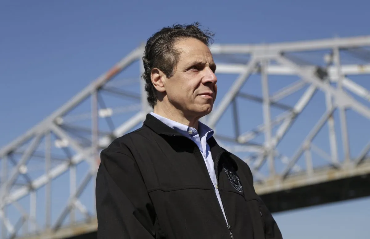 New York Governor Andrew Cuomo attends a media conference on a boat at the Tappan Zee Bridge near Nyack, N.Y., Monday, Oct. 6, 2014. Environmental groups are suing New York state over Gov. Andrew Cuomo's plan to use federal clean water funds on the new Tappan Zee Bridge. (AP Photo/Seth Wenig)