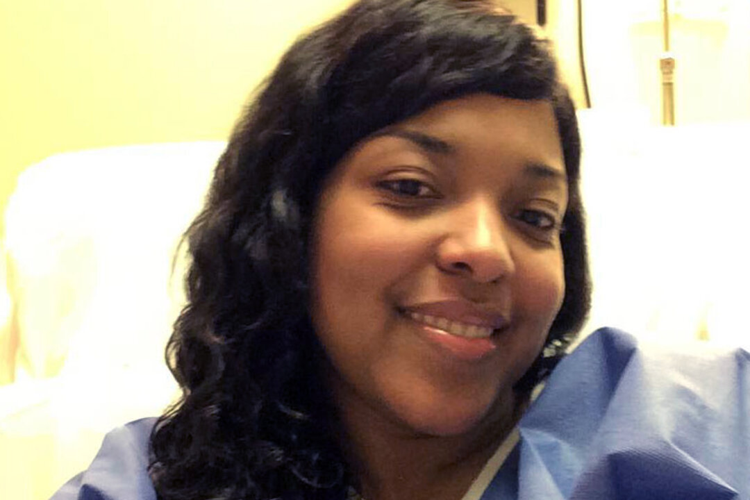 FILE - This Oct. 21, 2014, file photo, provided by Amber Vinson, shows Vinson at Emory University Hospital in Atlanta. Vinson, a Dallas nurse who was being treated for Ebola, will attend a news conference, Tuesday, Oct. 28, 2014, to discuss her discharge from the hospital after tests showed she's virus-free. (AP Photo/Amber Vinson, File)