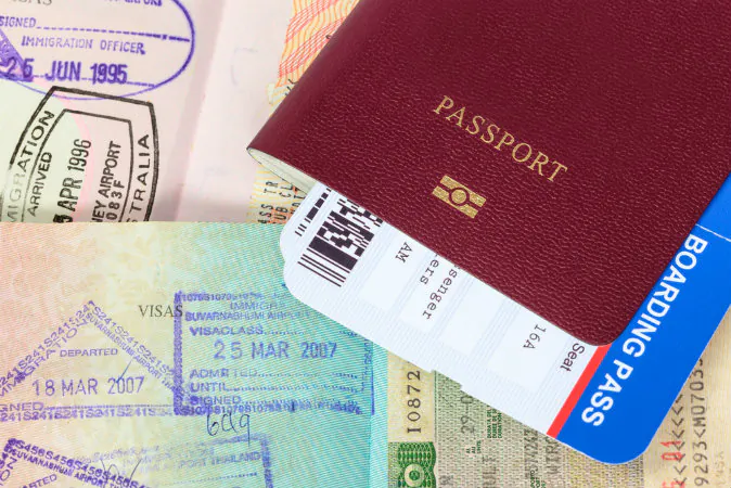 Visa immigration stamps (Shutterstock*)