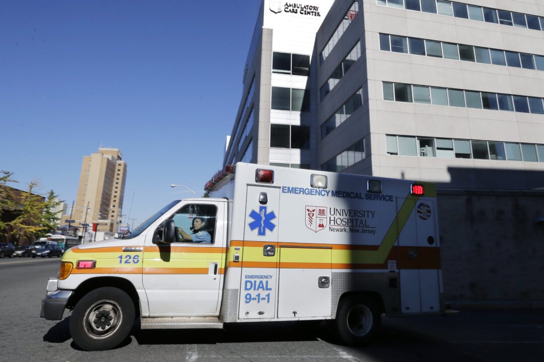 An ambulance drives near University Hospital of Newark in Newark, N.J. on Oct. 27, 2014. (Mel Evans/AP Photo)