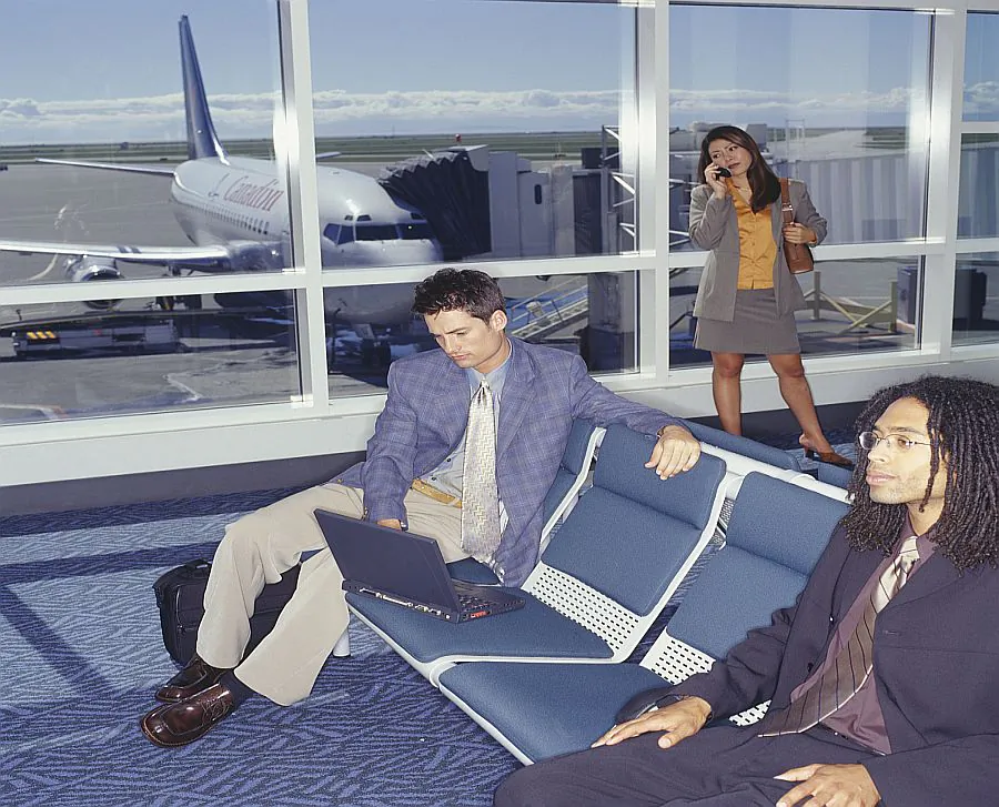 Whilst talking on phone in airport lounge, be careful of privacy (thinkstockphotos.com)
