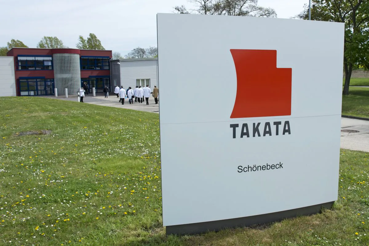 Journalists visit the production a production facility for international automotive supplier Takata Ignition Systems GmbH in Schoenebeck, Germany, on April 17, 2014. US safety regulators on Thursday, Oct. 30, 2014, ordered Takata Corp. to provide more information about air bags that can explode and shoot shrapnel toward drivers and passengers. (AP Photo/Jens Meyer)