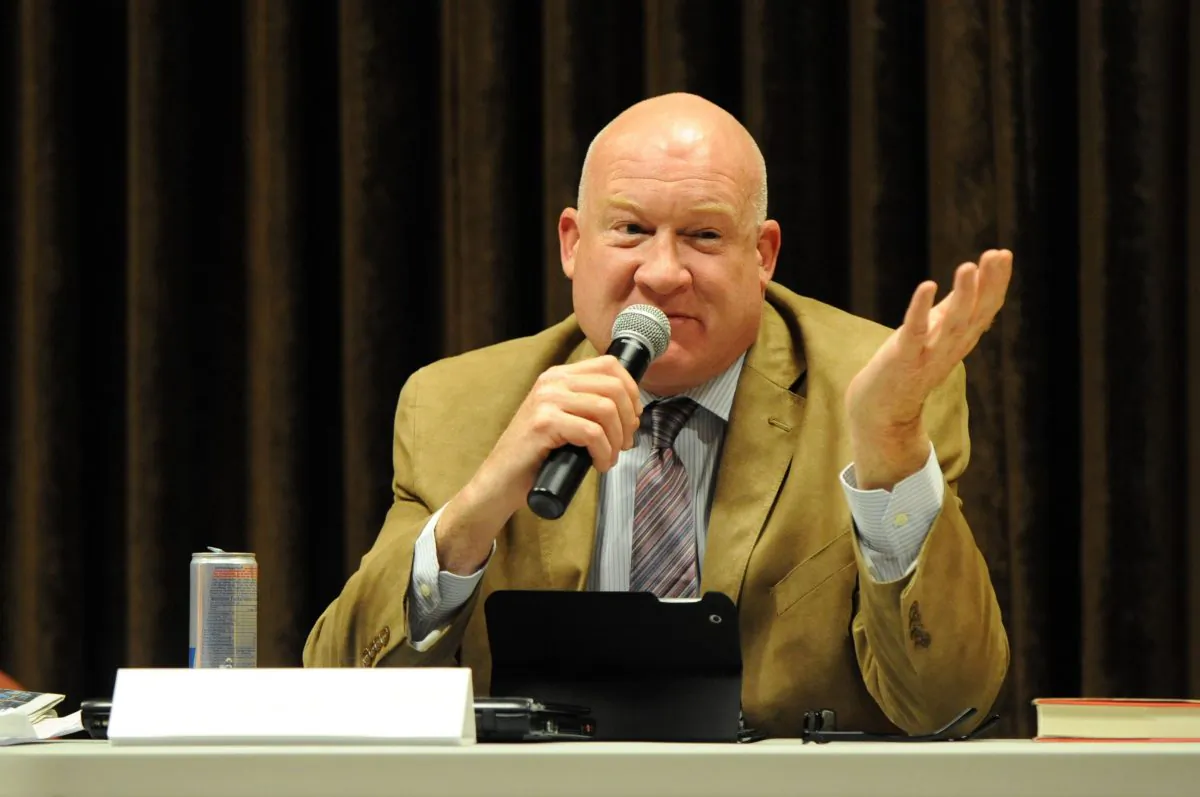 “The Slaughter” author Ethan Gutmann speaks during a forum in Calgary, Canada, on Oct. 29, 2014. (Jerry Wu/Epoch Times)