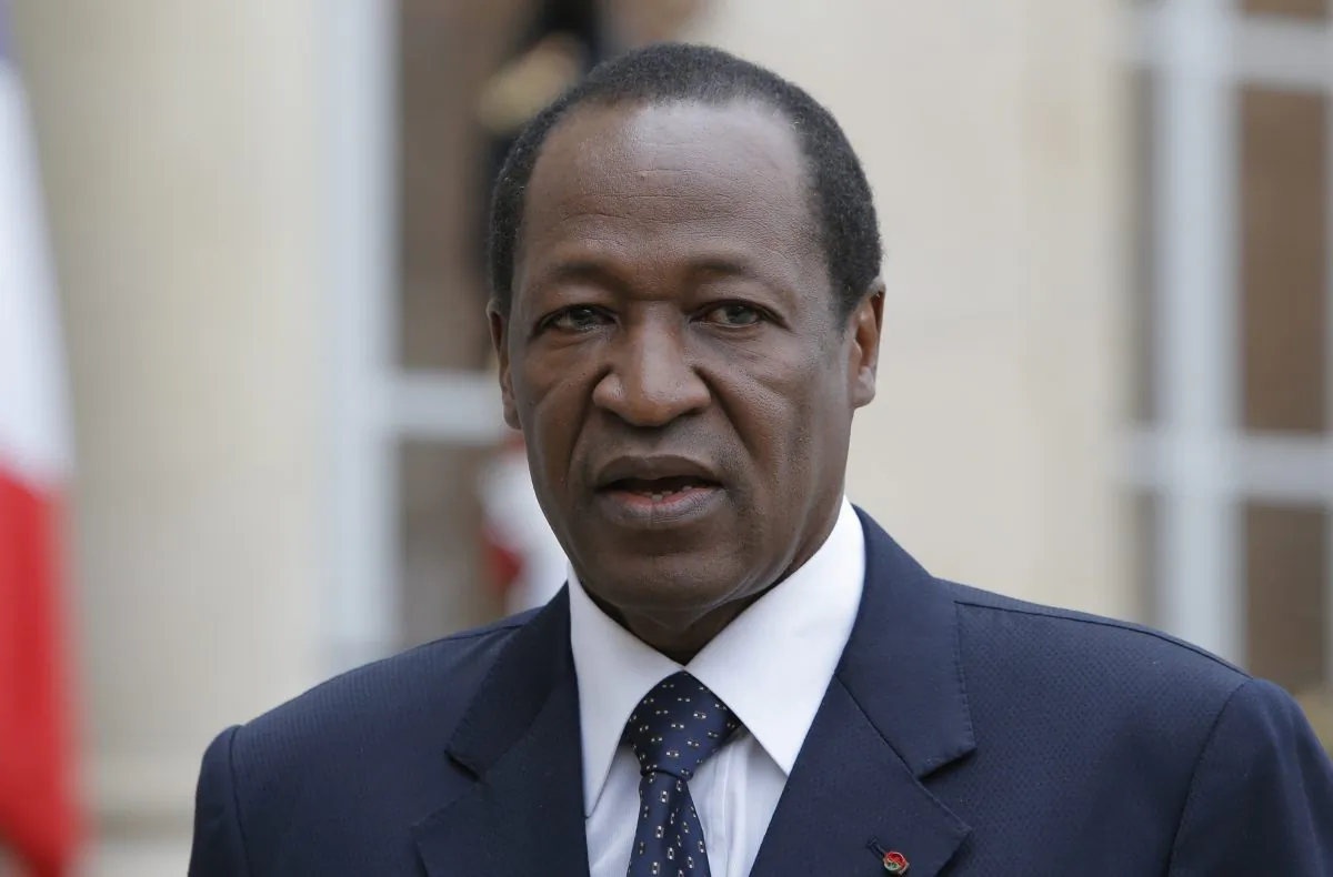 Burkina Faso President Blaise Compaore speaks to the media after a meeting with France's President Francois Hollande at the Elysee Palace in Paris on Sept, 18, 2012. President Blaise Compaore stepped down Friday Oct. 31, 2014 after 27 years in power and said elections would be held in 90 days following a wave of protests against his rule. The announcement, read out on television, was a sharp about-face from the day before, when protesters stormed the parliament but Compaore vowed to hold power through next year. (AP Photo/Francois Mori)