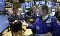 Wall Street Caps a Wild Month With a Rally