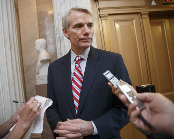 Sen. Rob Portman, R-Ohio speaks to reporters on Capitol Hill in Washington on May 12, 2014. With Republican control of the House and Senate tantalizingly close on Nov. 4, 2014, leading Republicans are turning to a matter often overlooked in campaigns: how to actually govern. "It's very possible to get a number of things done if the president is willing to come to the table, and I believe he will," says Portman. (AP Photo/File)