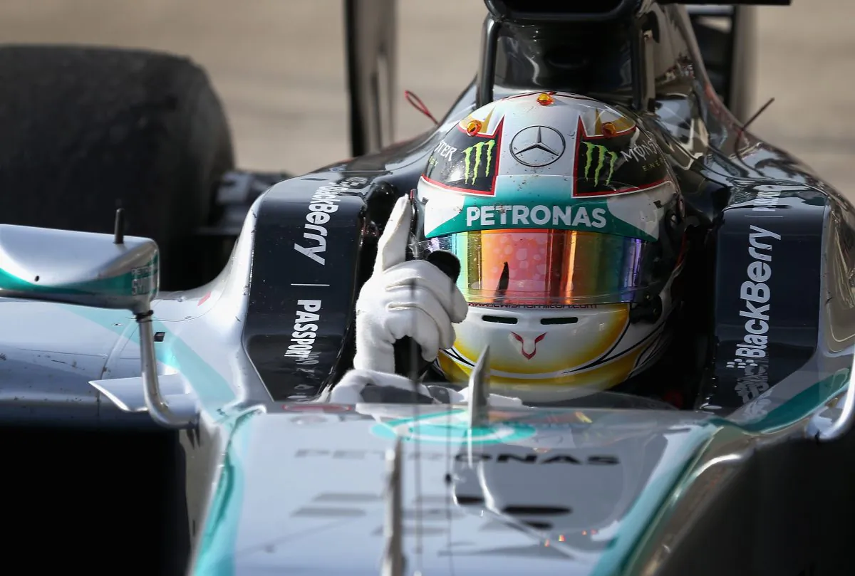 Lewis Hamilton of Mercedes GP celebrates following his victory in the Formula One United States Grand Prix at Circuit of The Americas on Nov. 2, 2014 in Austin, United States. (Clive Mason/Getty Images)