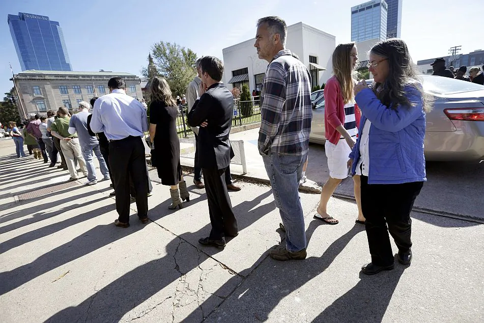 Voters wait in line to vote early in Little Rock, Ark., in a file photo. (AP Photo/Danny Johnston)