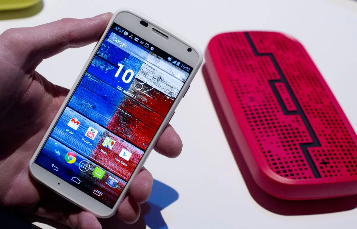 The Motorola Moto X smartphone, using Google's Android software, is displayed, Aug. 1, 2013 at a press preview in New York. (AP Photo/Mark Lennihan)