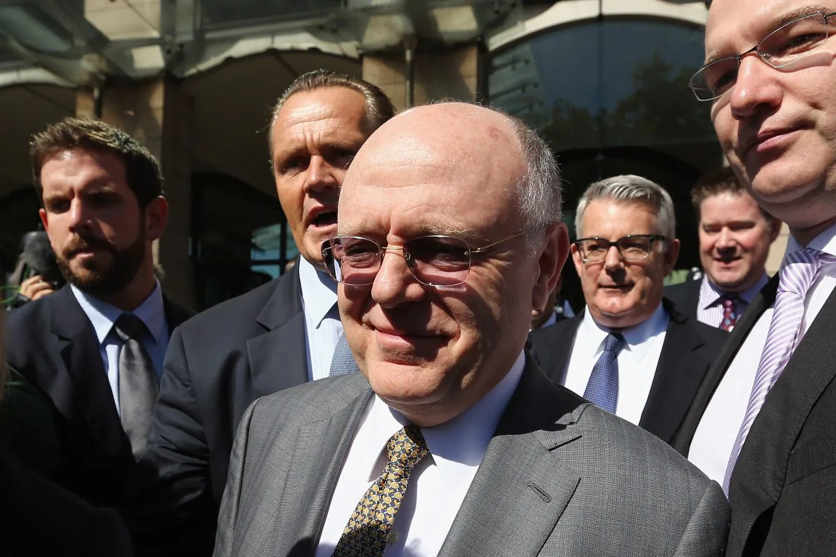 Ian Read, chief executive of Pfizer, leaves the House of Commons in London on May 14, 2014. Read gave evidence in relation to Pfizer's 63 billion pound takeover bid for British rival AstraZeneca. (Dan Kitwood/Getty Images)