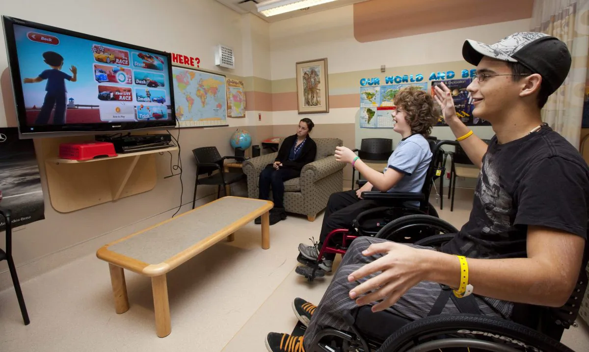 Patients at the Children's Hospital of Eastern Ontario play with a motion-tracking video game, Dec. 3, 2010. CHEO has launched a legal challenge against the U.S. patent holders of genes related to a rare heart disorder. (The Canadian Press/Sean Kilpatrick)