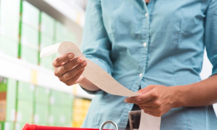 Don't touch receipts for too long, especially with wet hands. Shutterstock 