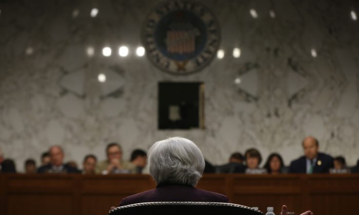 Federal Reserve Chair Janet Yellen testifies about the economy before the Joint Economic Committee of Congress on Capitol Hill in Washington, Wednesday, May 7, 2014. (AP Photo/Charles Dharapak)