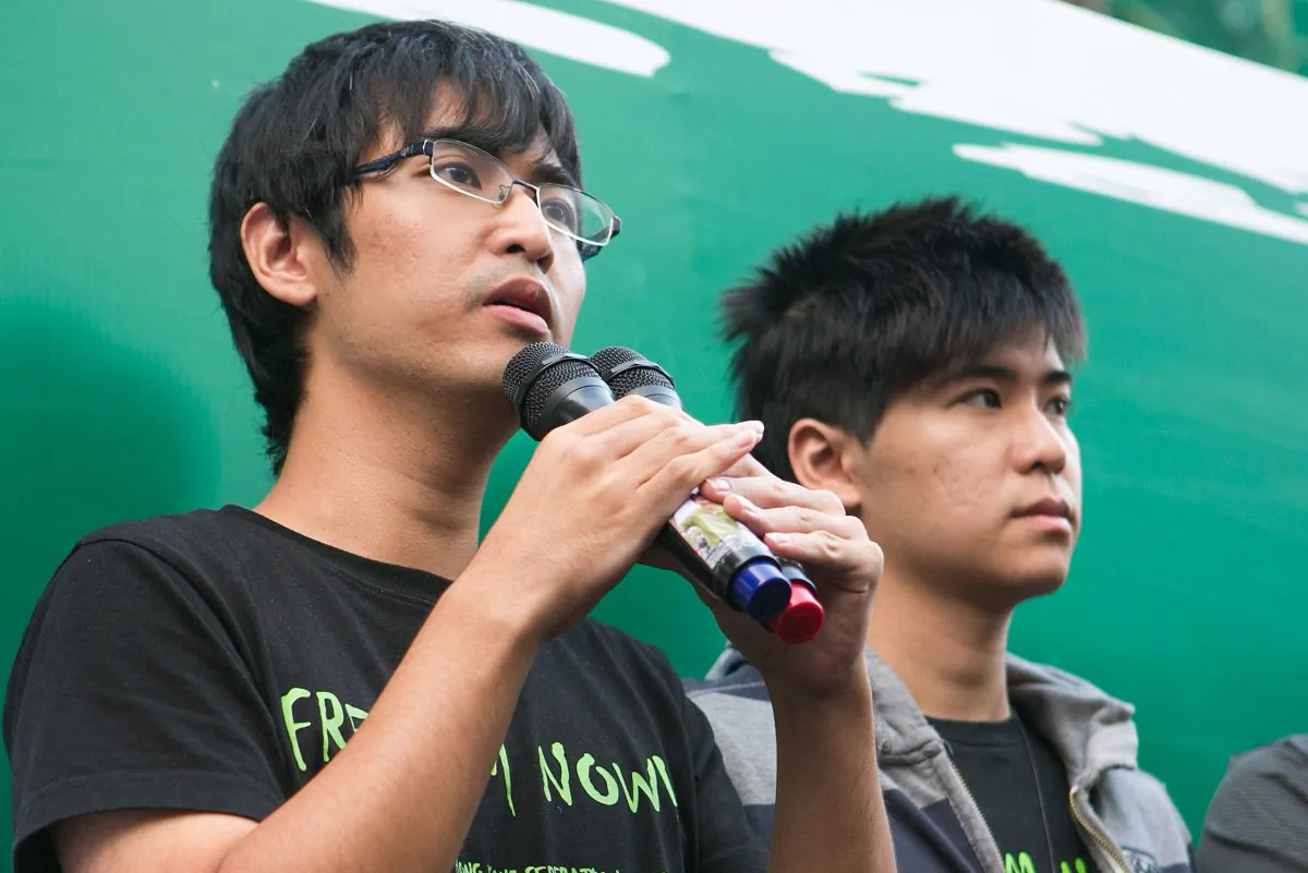 Alex Chow, secretary general of the Hong Kong Federation of Students, speaks at a press conference in the Central District of Hong Kong on Oct. 9, 2014. The HKFS recently confirmed that it plans on a trip to Beijing to meet top Party leaders later in the month. (Benjamin Chasteen/Epoch Times)