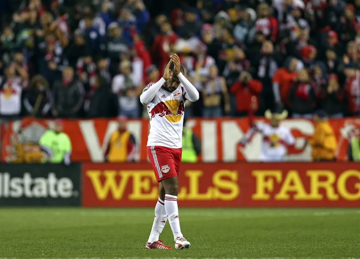 Thierry Henry of the New York Red Bulls acknowledges the crowd as he leaves the first game against the D.C. United on Nov. 2, 2014, in Harrison, N.J. (AP Photo/Adam Hunger)