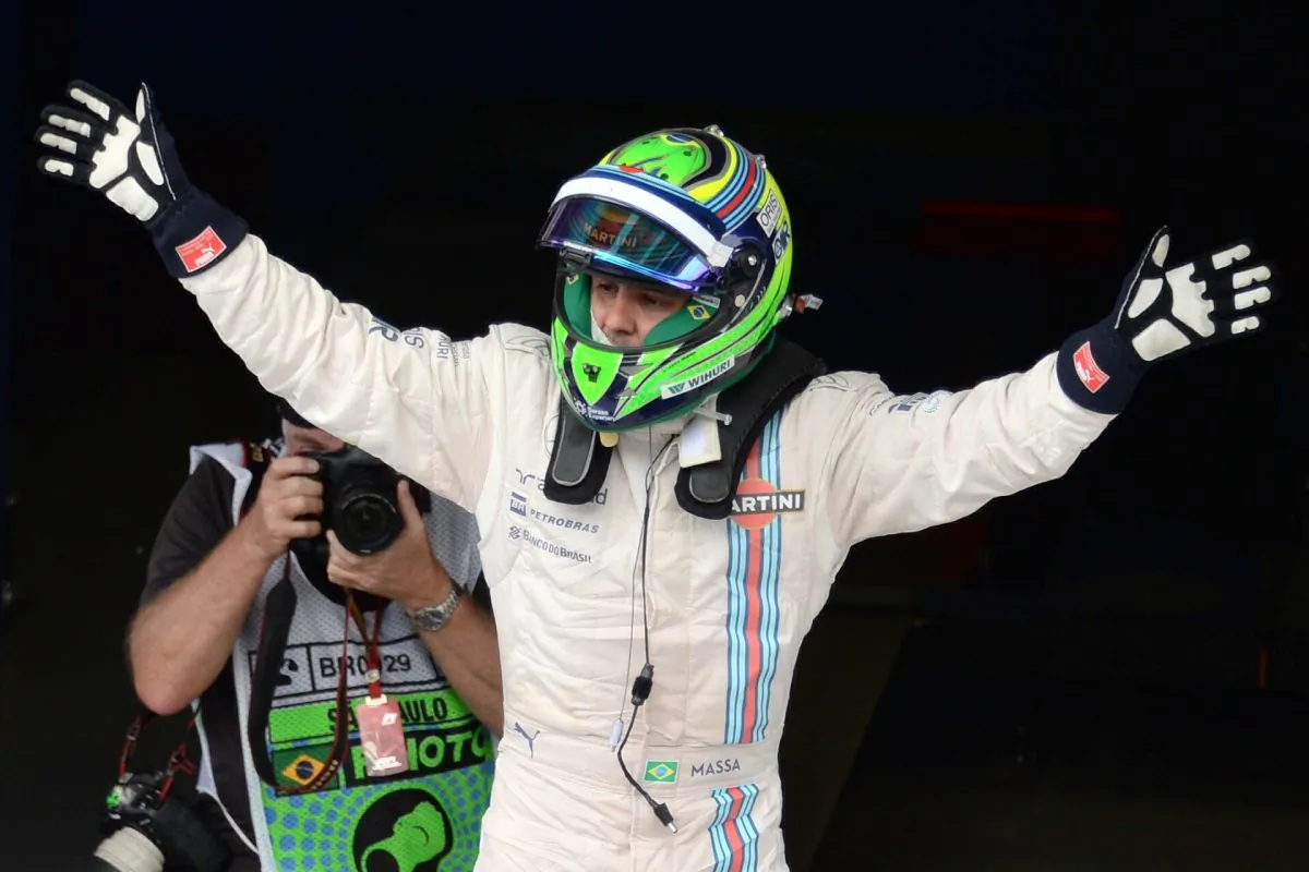 Nico Rosberg celebrates after winning the Formula One Brazilian Grand Prix at the Interlagos racetrack in Sao Paulo, Brazil on November 9, 2014. (Nelson Almeida/AFP/Getty Images)