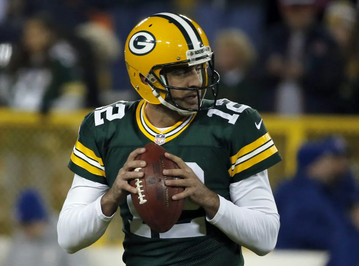 Green Bay Packers quarterback Aaron Rodgers (12) warms up before of an NFL football game against the Chicago Bears Sunday, Nov. 9, 2014, in Green Bay, Wis. (AP Photo/Kiichiro Sato)