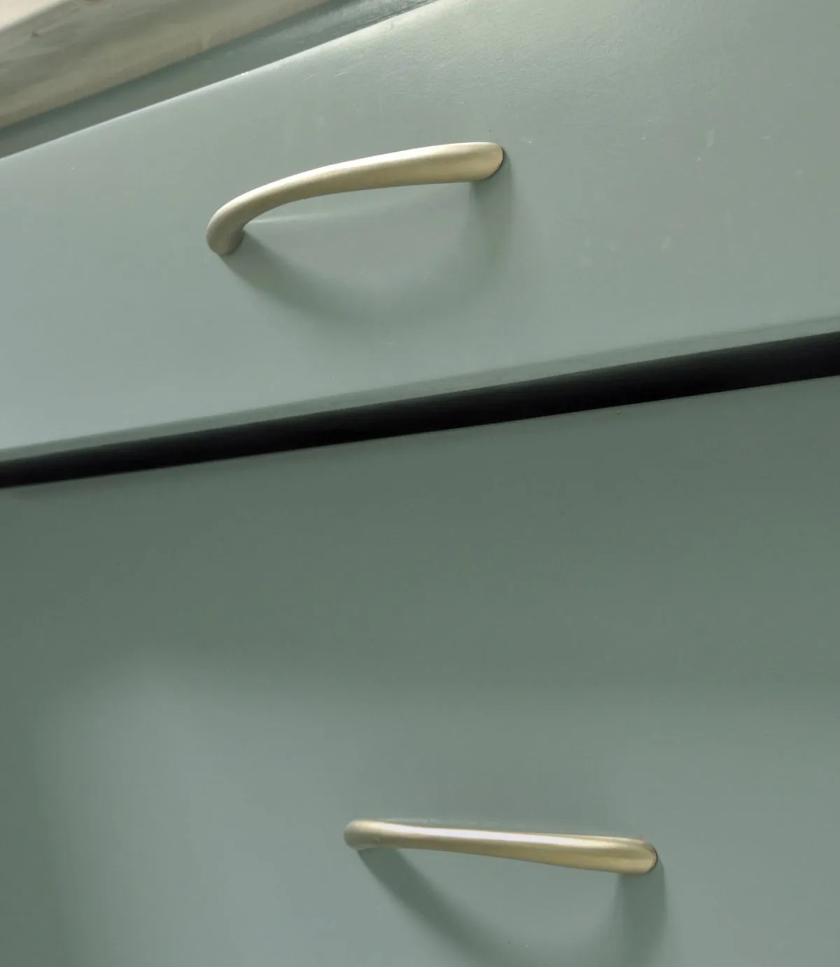 Freshly painted kitchen cabinets with upgraded hardware. (varandah/iStock/Thinkstock)
