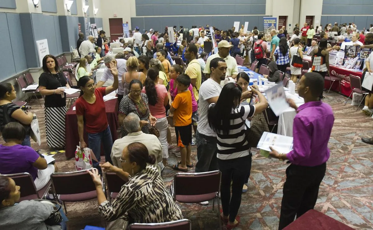 Officials from the State Department of Labor and the main casino workers' union, Local 54 of Unite-HERE, help displaced workers file for unemployment at the Atlantic City Convention Center in Atlantic City, N.J., on Sept. 3, 2014. More than 5,000 employees at the Showboat and Revel Casinos lost their jobs as both places closed this weekend. (Jessica Kourkounis/Getty Images)