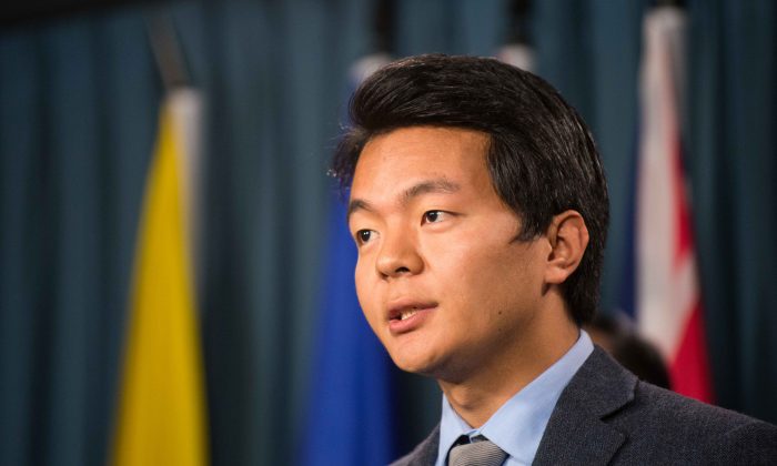 Urgyen Badheytsang, national director of Students for a Free Tibet Canada, seen during a press conference on Nov. 6, 2014, in Ottawa, says Tibetans are frequently arrested when the Chinese regime catches them emailing information about abuses to the outside world. A new report published by Citizen Lab, an interdisciplinary laboratory based at the University of Toronto's Munk School of Global Affairs, uncovers widespread cyber attacks being waged against groups in Canada involved in human rights work. (Matthew Little/Epoch Times)