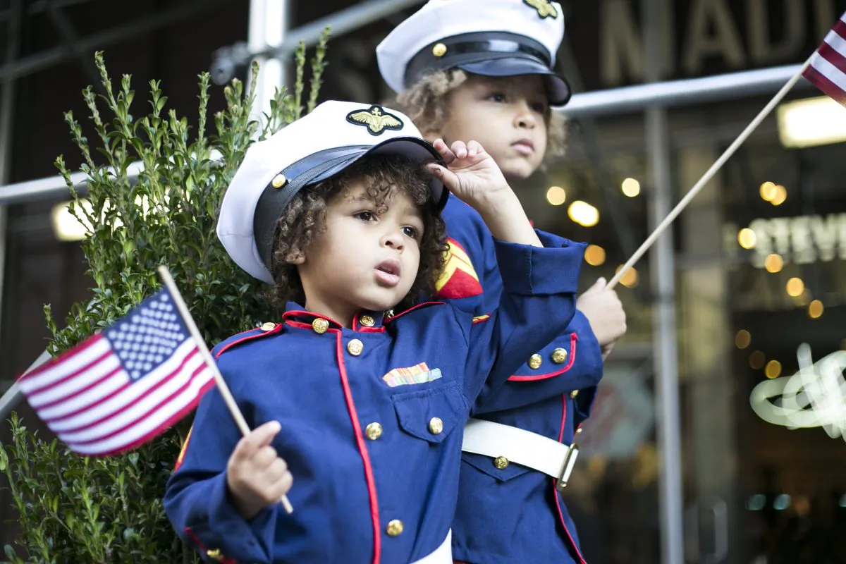 Maverick Foreman, 3, and Xander Foreman, 6, (L–R), at the New York Veterans' Day Parade in Manhattan, N.Y., on Tuesday, Nov. 11, 2014. (Samira Bouaou/Epoch Times)