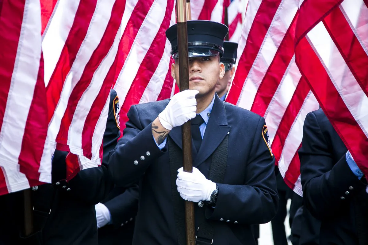 Service members march in the New York Veterans' Day Parade on Fifth Avenue, Manhattan, on Nov. 11, 2014. (Samira Bouaou/Epoch Times)