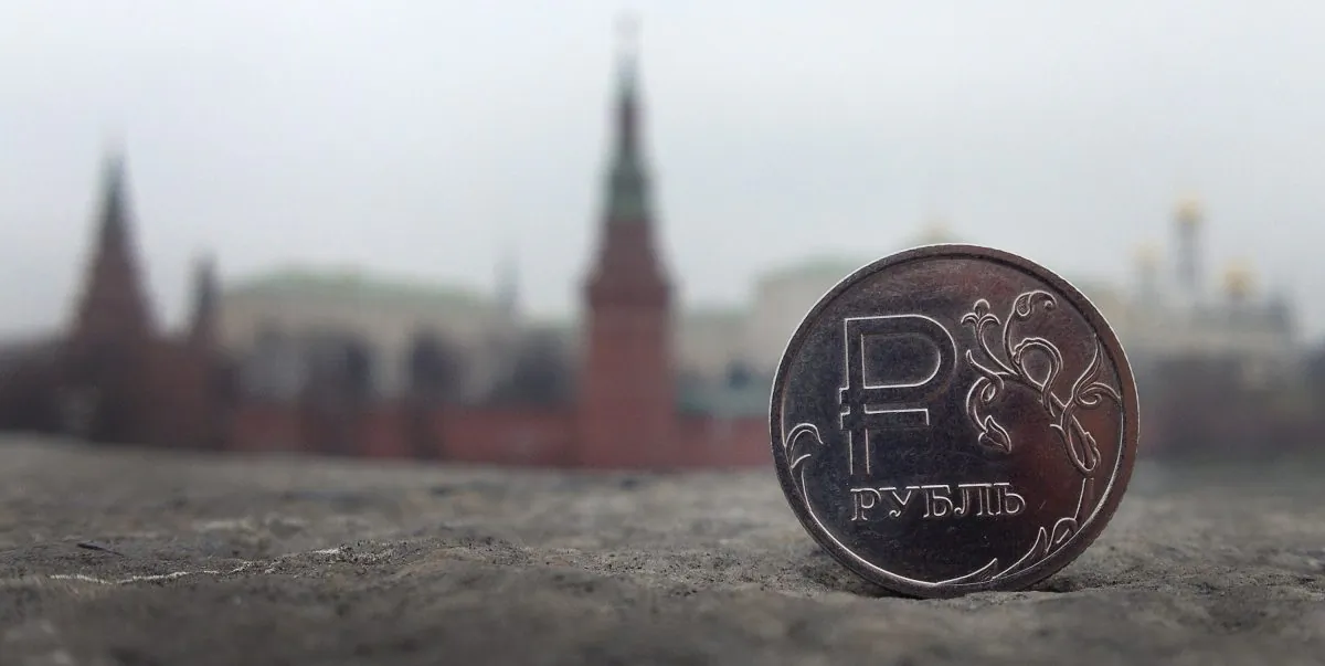 A Russian ruble coin is pictured in front of the Kremlin in in central Moscow, on Nov. 6, 2014. (Alexander Nemenov/AFP/Getty Images)