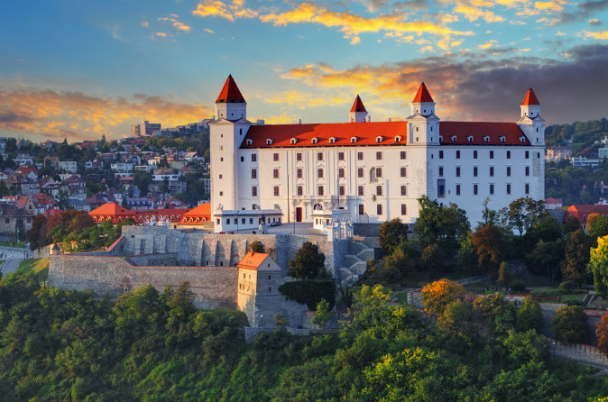 Bratislava castle at sunset via Shutterstock*