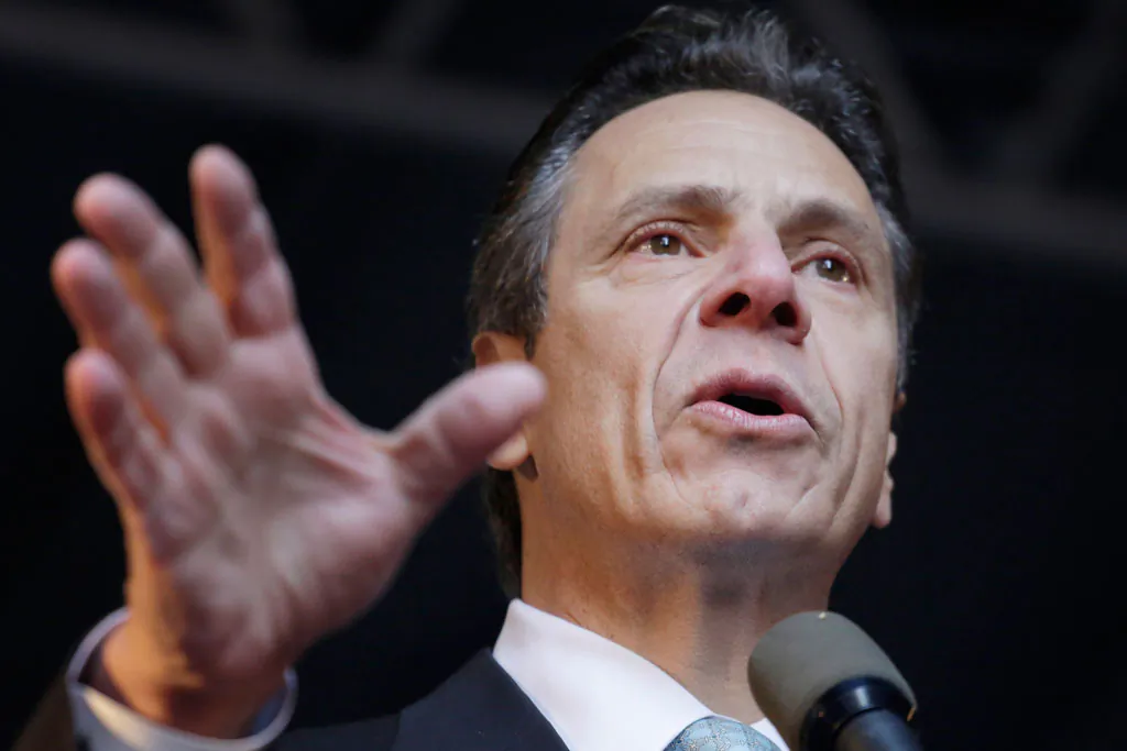 New York Gov. Andrew Cuomo in Times Square, New York, on Nov. 3, 2014. Cuomo has vowed to push for a higher minimum wage, and a special legislative session this fall could be his best opportunity to make good on his promise, but he and top lawmakers say it's unlikely to happen. (AP Photo/Mark Lennihan)