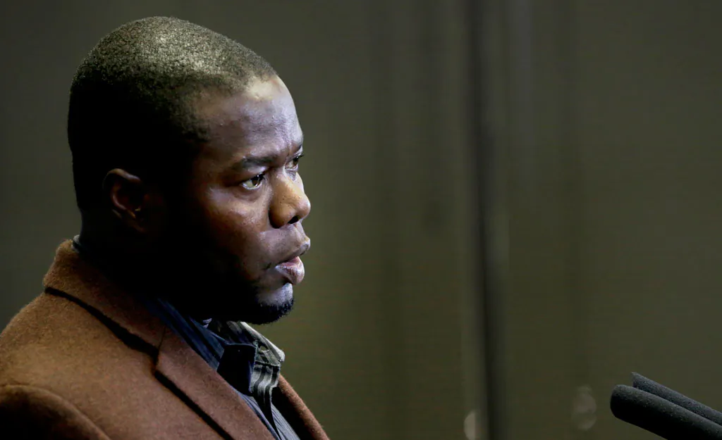 Josephus Weeks, nephew of Thomas Eric Duncan, speaks during a news conference in Dallas, Wednesday, Nov. 12, 2014. The hospital that treated Duncan, the only Ebola patient to die in the United States, will pay his relatives an undisclosed sum and create a charitable foundation in his name, the family’s attorney said Wednesday. (AP Photo/LM Otero)