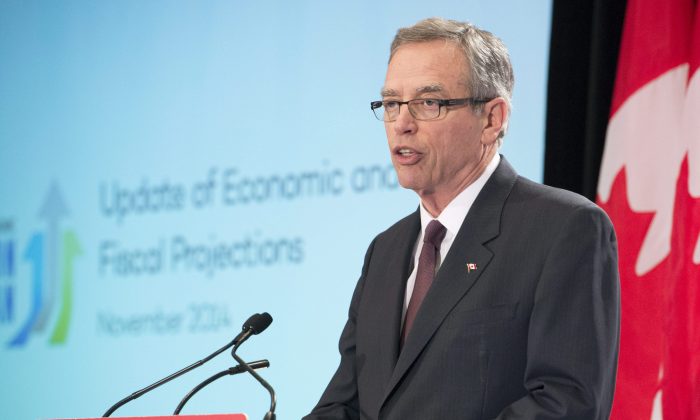 Finance Minister Joe Oliver delivers the Update of Economic and Fiscal Projections at a luncheon in Toronto on Nov. 12, 2014. (The Canadian Press/Frank Gunn)