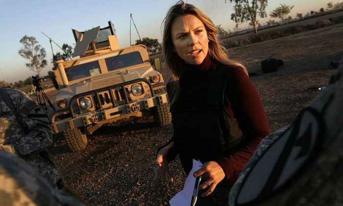 Chris Hondros/Getty Images

Journalist Lara Logan of CBS News questions U.S. Soldiers in Camp Victory in Baghdad, Iraq November 17, 2006. 