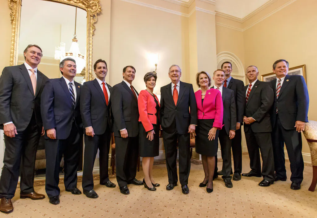 Senate Minority Leader Mitch McConnell of Ky. (C) hosts a gathering of new GOP Senators-elect in his office on Capitol Hill in Washington, Wednesday, Nov. 12, 2014. (L-R) Sen.-elect David Perdue (R-Ga.), Sen.-elect Cory Gardner (R-Colo.), Sen.-elect Ben Sasse (R-Neb.), Sen.-elect Mike Rounds (R-S.D.), Sen.-elect Joni Ernst (R-Iowa), McConnell, Sen.-elect Shelley Moore Capito (R-W.Va.), Sen.-elect James Lankford (R-Okla.), Sen.-elect Tom Cotton (R-Ark.), Sen.-elect Thom Tillis (R-N.C.), and Sen.-elect Steve Daines (R-Mont). (AP Photo/J. Scott Applewhite)
