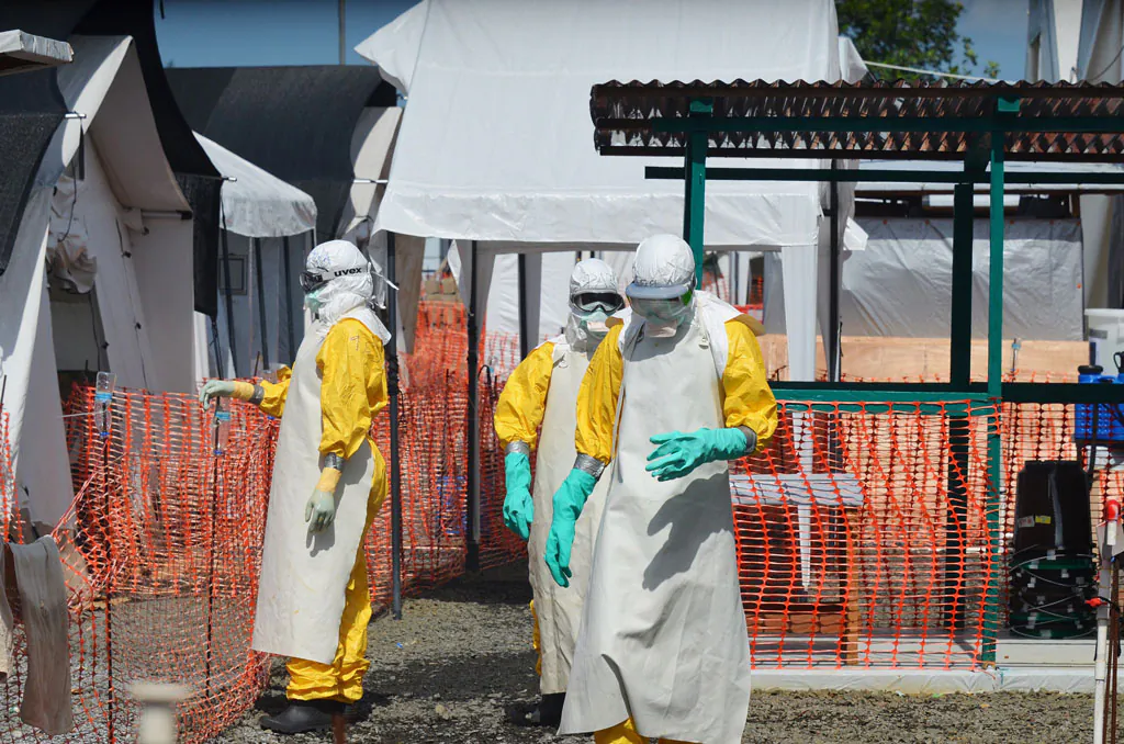 Health workers at a clinic run by the non-governmental organization Doctors Without Borders in Monrovia, Liberia, on Nov. 1, 2014. (Zoom Dosso/AFP/Getty Images)