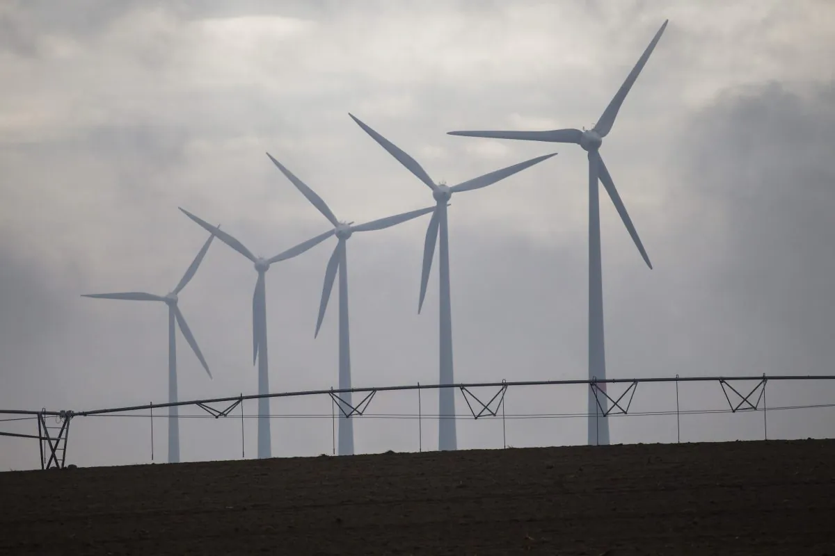 Wind turbines at the energy-sufficient village of Feldheim, 50 miles south of Berlin, Germany on Oct. 16, 2014. The EU is hoping to cut 20 percent of its energy consumption by 2020, and is hoping to diversity its energy portfolio. (Odd Aandersen/AFP/Getty Images)