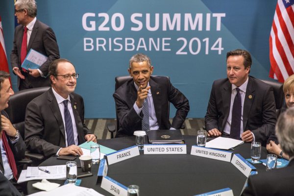 (L-R) Spanish President Mariano Rajoy Brey, Italian PM Matteo Renzi, French President Francois Hollande, U.S. President Barack Obama, British PM David Cameron, German Chancellor Angela Merkel and European Commission President Jean-Claude Juncker attend the Transatlantic Trade and Investment Partnership (TTIP) meeting at the G20 Summit in Brisbane, Australia, on Nov. 16, 2014. (Glenn Hunt/Getty Images)