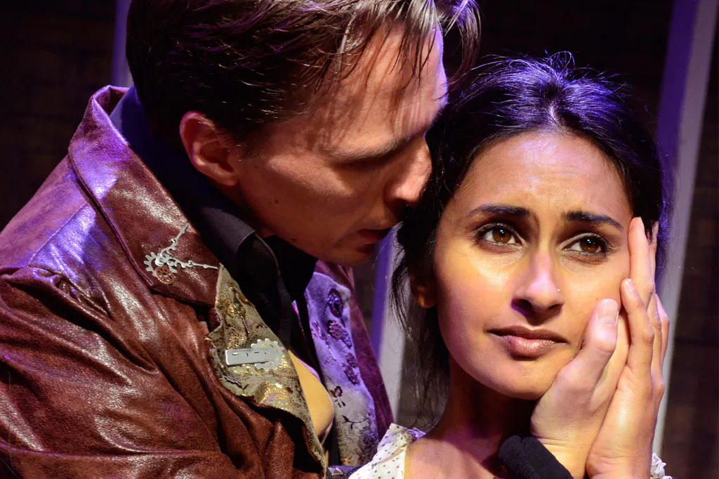 Despite her love for Mr. Rochester (John Henry Roberts), Jane Eyre (Anu Bhatt) is determined to leave him, in Lifeline Theatre’s production of “Jane Eyre.” (Suzanne Plunkett)