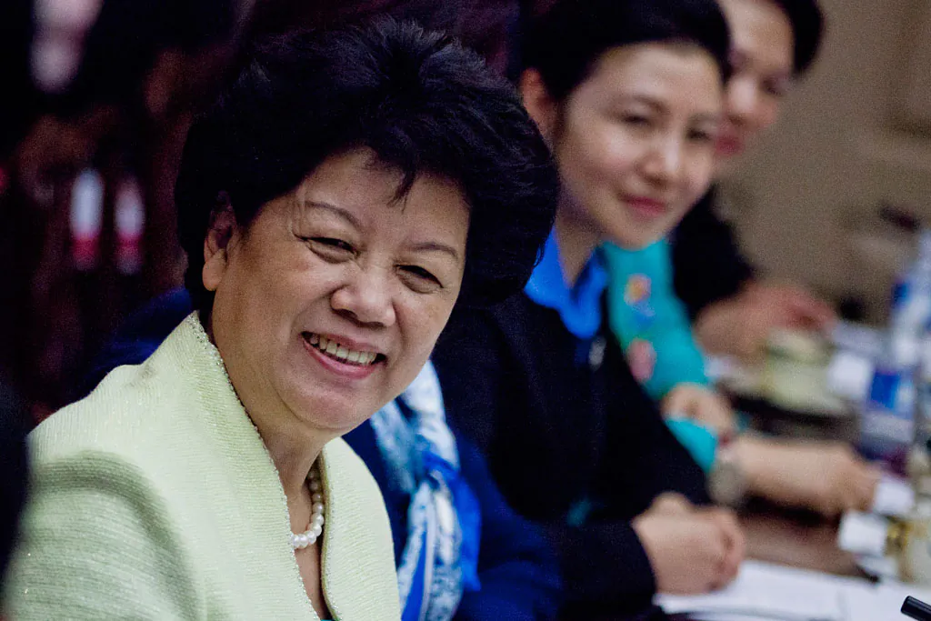 Chen Zhili (foreground), who was Minister of Education from 1998-2003 in the People's Republic of China before becoming vice-chair of the National People's Congress, sits at a table with U.S. Secretary of State Hillary Clinton at the State Department on March 28, 2012, in Washington, D.C. Chen pushed to commercialize education in China, which led to greater corruption in the industry. (T.J. Kirkpatrick/Getty Images)