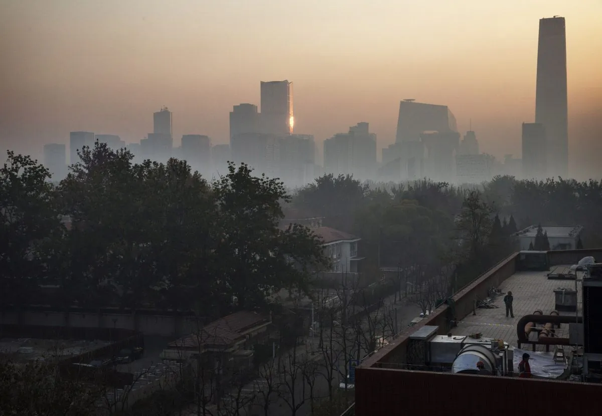 Smog covers the skyline in Beijing on Nov. 16, 2014. (Kevin Frayer/Getty Images)