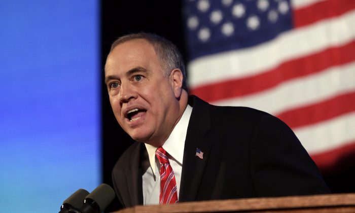 New York state Comptroller Thomas DiNapoli accepting his party's nomination for re-election during the opening session of the state's Democratic Convention, in Melville, N.Y., May 21, 2014. (AP Photo/Richard Drew)