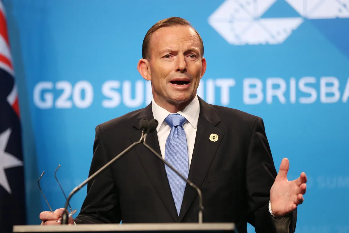 Australia's Prime Minister Tony Abbott speaks to the media during a press conference at the conclusion of the G-20 summit in Brisbane, Australia, Sunday, Nov. 16, 2014. (AP Photo/Rob Griffith)