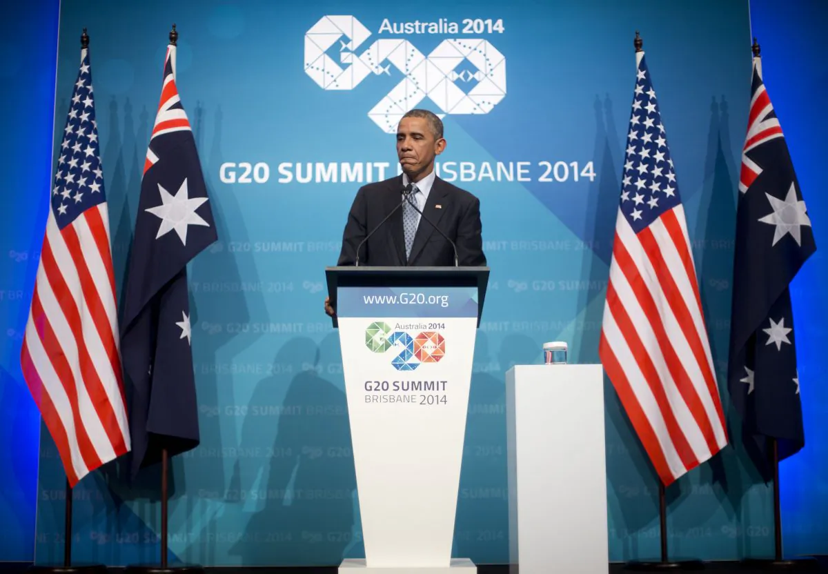 U.S. President Barack Obama pauses during his news conference at the G20 Summit in Brisbane, Australia, Sunday, Nov. 16, 2014. (AP Photo/Pablo Martinez Monsivais)