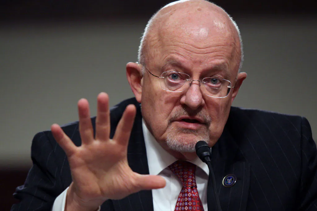 Director of National Intelligence James Clapper testifies on Capitol Hill in Washington on Feb. 11, 2014. The North Koreans passed word they wanted a high-ranking US government official for the job, so President Barack Obama sent Clapper, a gruff former general, to spirit home two Americans held captive by the hard-line communists. Clapper is no diplomat by training, and that's perhaps just why he earned the clandestine call. (AP Photo/Lauren Victoria Burke)