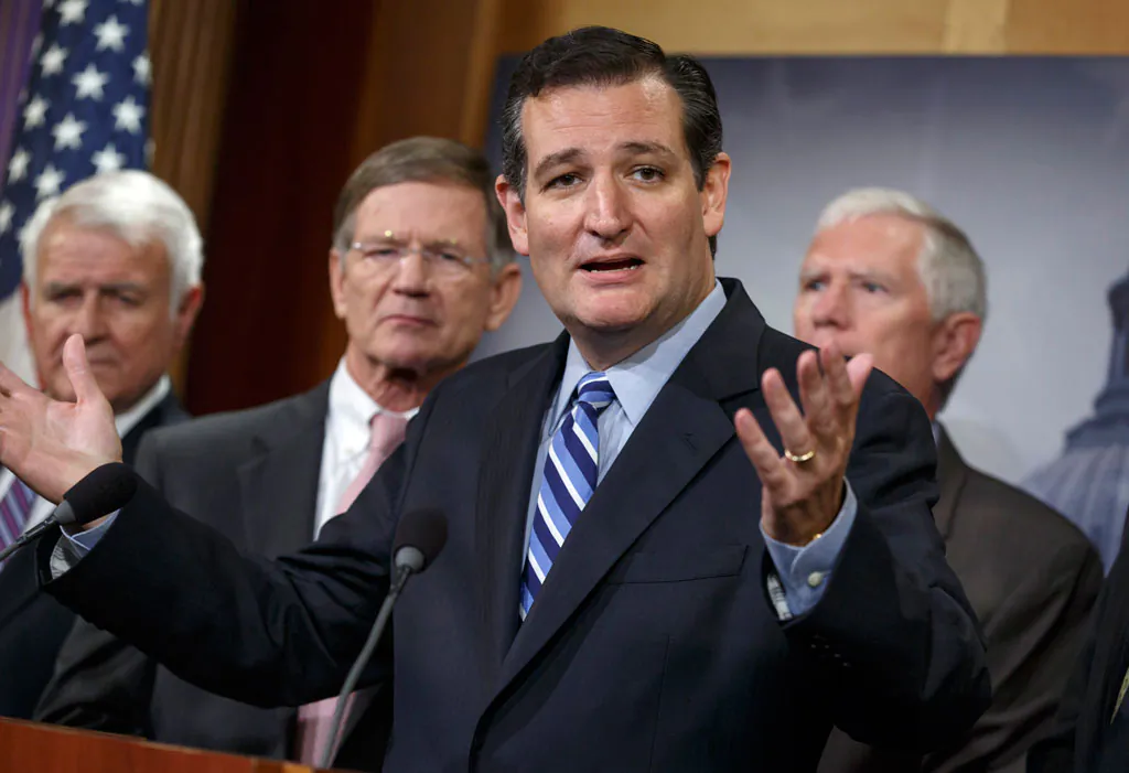 Sen. Ted Cruz (R-Texas) criticizes President Barack Obama, saying he has not taking a stand on the immigration crisis on the US-Mexico border and is putting off executive action until after the politically-charged midterm election in November, on Sept. 9, 2014. (AP Photo/J. Scott Applewhite)