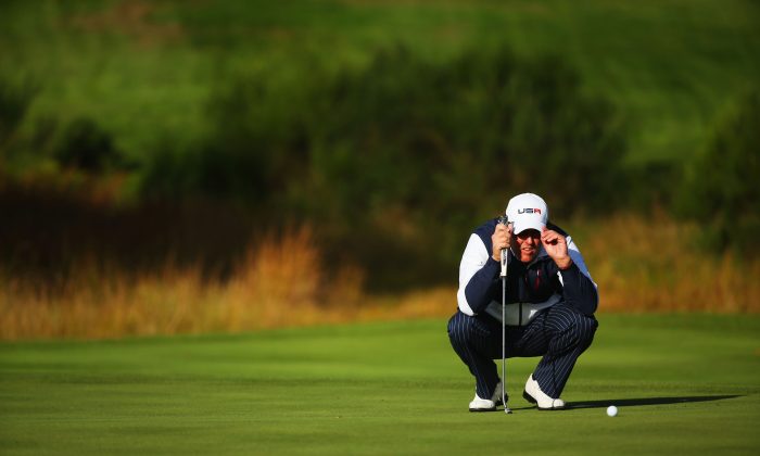 Phil Mickelson lines up a putt on the sixth green during the Morning Fourballs of the 2014 Ryder Cup on the PGA Centenary course at the Gleneagles Hotel on Sept. 26 in Auchterarder, Scotland. (Mike Ehrmann/Getty Images) 