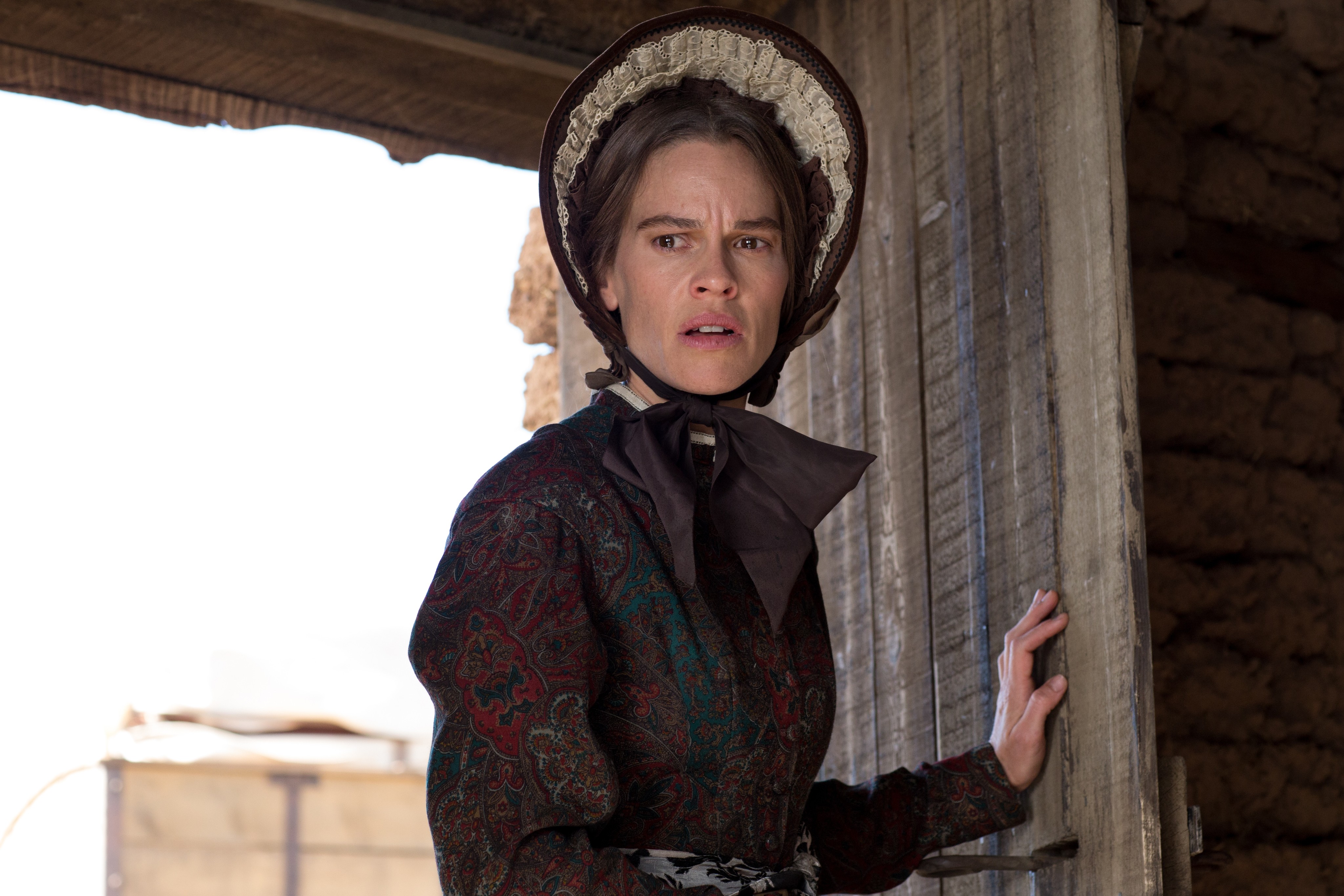 woman with bonnet in THE HOMESMAN 