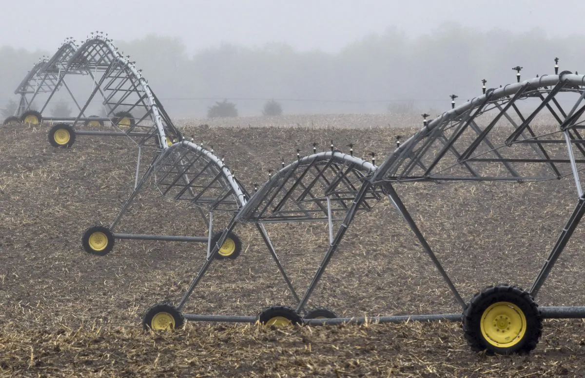 An irrigation pivot remains still along highway 14, several miles near the proposed new route for the Keystone XL pipeline in Neligh, Neb. , April 19, 2012. Congress is scrambling to vote on the Keystone XL oil pipeline, but the project could still end up before an obscure commission in Nebraska that regulates telephones, taxi cabs and grain bins. (AP Photo/Nati Harnik)